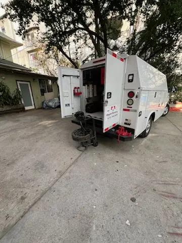 Magnet Plumbing service vehicle on-site for Grease Trap Cleaning in Peterboro